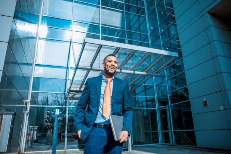 A handsome black ethnicity businessman going back to the office after lockdown